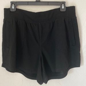 Women’s black shorts athletic work Brand front pockets Wide band on top of pants